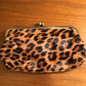 Clutch with Cheetah print hair texture on one side, brown leather on reverse!